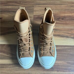 Converse high tops, water proof. Size 7 women’s.